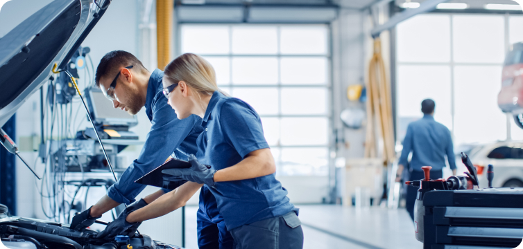 Mechanics working on a car